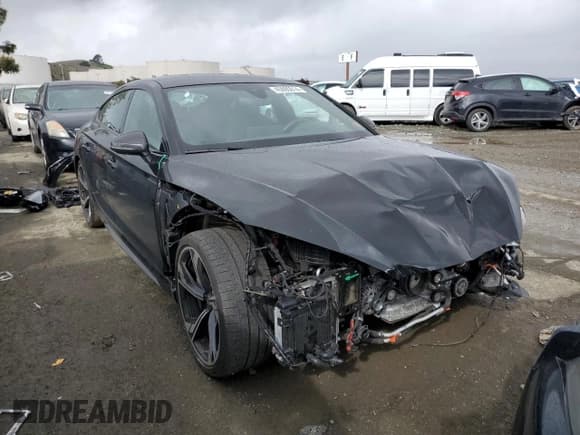 ✅ 2022 Audi RS 5 Sportback • VIN: WUAAWCF53NA902427 • Lot: 45095014. Listed on Copart with 13,104 mi. Free auction sales archive from the USA and detailed vehicle history report at DreamBid. Image 4.