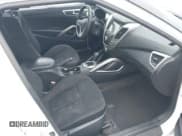 ✅ 2015 Hyundai Veloster • VIN: KMHTC6AD5FU232471 • Lot: 41486277. Wystawiony na IAAI z przebiegiem 167 304 mil. Bezpłatny archiwum sprzedaży aukcyjnych z USA i szczegółowy raport historii pojazdu na DreamBid. Zdjęcie 5.