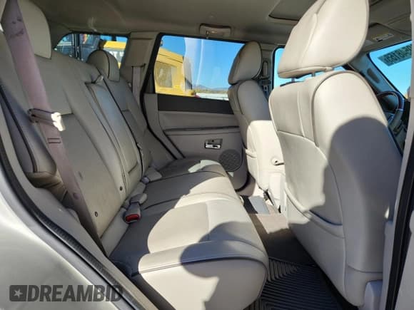 ✅ 2009 Jeep Grand Cherokee • VIN: 1J8HR68T69C520847 • Lot: 89548155. Listed on Copart with 322,340 mi. Free auction sales archive from the USA and detailed vehicle history report at DreamBid. Image 11.