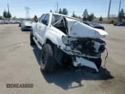 ✅ 2015 Toyota Tacoma PreRunner • VIN: 3TMKU4HN2FM046889 • Lot: 63442245. Listed on Copart with 114,391 mi. Free auction sales archive from the USA and detailed vehicle history report at DreamBid. Image 14.