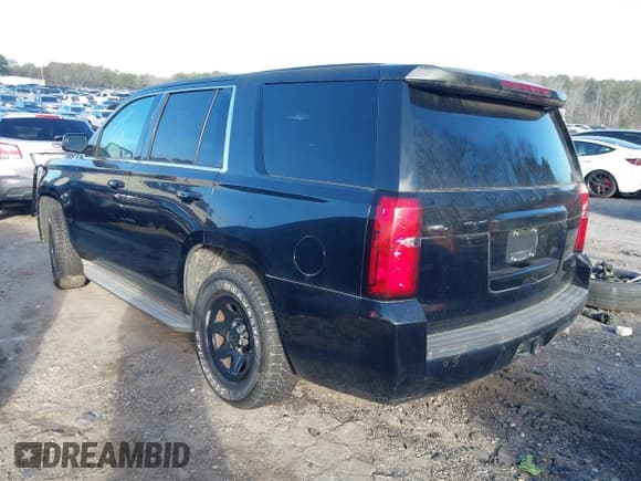 ✅ 2015 Chevrolet Tahoe Commercial • VIN: 1GNLC2EC4FR535329 • Lot: 41643486. Listed on IAAI with 185,326 mi. Free auction sales archive from the USA and detailed vehicle history report at DreamBid. Image 3.