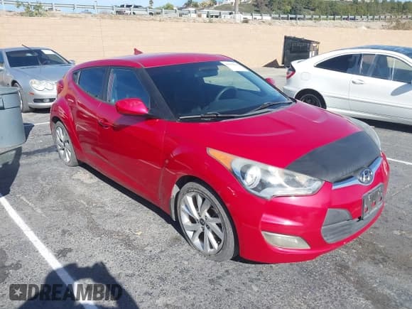 ✅ 2016 Hyundai Veloster • VIN: KMHTC6ADXGU277536 • Lot: 41419381. Wystawiony na IAAI z przebiegiem 104 391 mil. Bezpłatny archiwum sprzedaży aukcyjnych z USA i szczegółowy raport historii pojazdu na DreamBid. Zdjęcie 1.