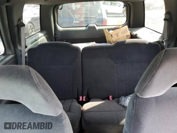 1997 Chevrolet Blazer LS z VIN 1GNDT13W7V2156165, wystawiony jako Copart lot #66759394 z przebiegiem 170 046 mil mil oraz Szkoda całkowita • Salvage title. Historia ofert i sprzedaży dostępna na DreamBid. Obrazek 10.