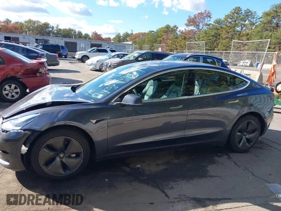 ✅ 2018 Tesla Model 3 Long Range Battery • VIN: 5YJ3E1EB6JF054372 • Lot: 43531884. Listed on IAAI with 87,672 mi. Free auction sales archive from the USA and detailed vehicle history report at DreamBid. Image 14.