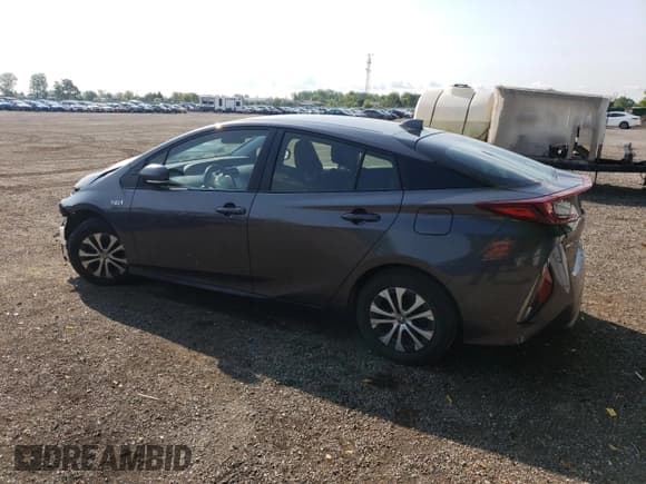✅ 2022 Toyota Prius LE • VIN: JTDKAMFP1N3223218 • Lot: 58561985. Listed on Copart with 98,017 mi. Free auction sales archive from the USA and detailed vehicle history report at DreamBid. Image 2.