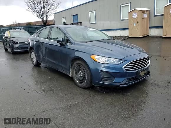 ✅ 2019 Ford Fusion S • VIN: 3FA6P0G77KR129242 • Лот: 90438905. Опубликован ранее на Copart с пробегом 71 785 миль. Бесплатный доступ к архиву аукционных продаж из США и подробный отчёт об истории автомобиля на DreamBid. Изображение 13.