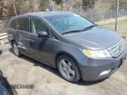 ✅ 2012 Honda Odyssey Touring • VIN: 5FNRL5H92CB116899 • Lot: 41907863. Listed on IAAI with 225,221 mi. Free auction sales archive from the USA and detailed vehicle history report at DreamBid. Image 1.