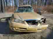 2004 Hyundai Elantra GLS z VIN KMHDN46D14U721426, wystawiony jako Copart lot #82985934 z przebiegiem Nie podano mil oraz Szkoda całkowita • Salvage title. Historia ofert i sprzedaży dostępna na DreamBid. Obrazek 5.