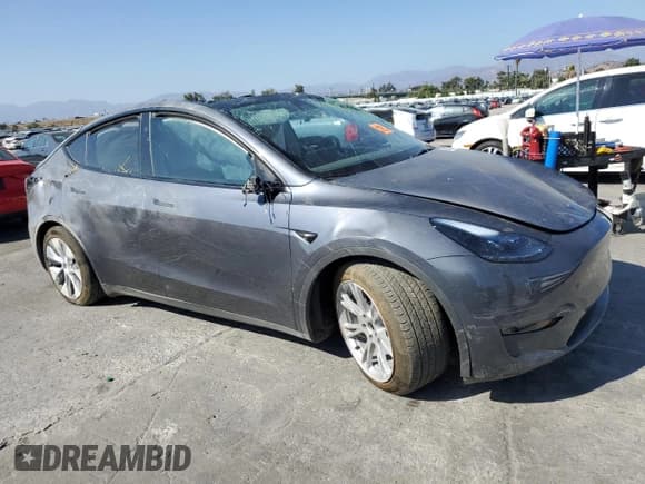 ✅ 2023 Tesla Model Y • VIN: 7SAYGDED7PF963865 • Lot: 69295755. Listed on Copart with 11,750 mi. Free auction sales archive from the USA and detailed vehicle history report at DreamBid. Image 4.