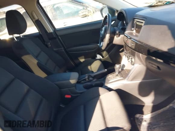 ✅ 2014 Mazda CX-5 Touring • VIN: JM3KE4CY3E0302724 • Lot: 43319905. Wystawiony na IAAI z przebiegiem 128 003 mil. Bezpłatny archiwum sprzedaży aukcyjnych z USA i szczegółowy raport historii pojazdu na DreamBid. Zdjęcie 5.