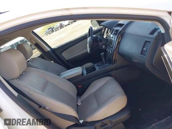 ✅ 2015 Mazda CX-9 Touring • VIN: JM3TB3CV1F0461403 • Lot: 42148325. Listed on IAAI with 143,452 mi. Free auction sales archive from the USA and detailed vehicle history report at DreamBid. Image 5.