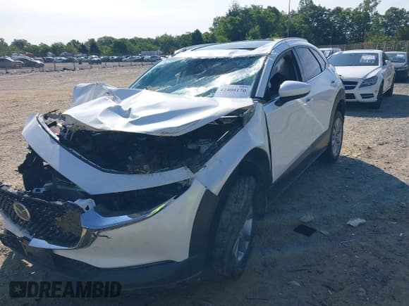 ✅ 2021 Mazda CX-30 Premium • VIN: 3MVDMBDL2MM236267 • Lot: 42400170. Listed on IAAI with Not provided. Free auction sales archive from the USA and detailed vehicle history report at DreamBid. Image 2.