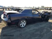 ✅ 2014 Dodge Challenger SXT • VIN: 2C3CDYAG9EH256205 • Lot: 72760154. Wystawiony na Copart z przebiegiem Nie podano. Bezpłatny archiwum sprzedaży aukcyjnych z USA i szczegółowy raport historii pojazdu na DreamBid. Zdjęcie 3.