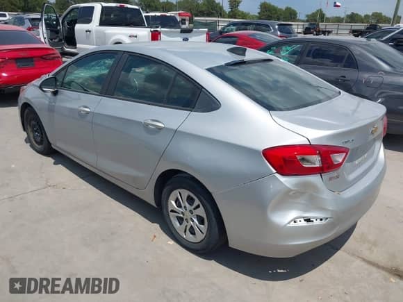 2019 Chevrolet Cruze z VIN 1G1BJ5SM4K7106148, wystawiony jako IAAI lot #43014430 z przebiegiem 100 571 mil mil oraz . Historia ofert i sprzedaży dostępna na DreamBid. Obrazek 3.