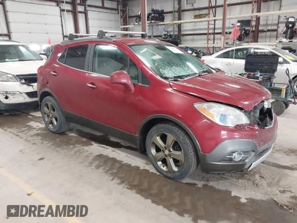 ✅ 2013 Buick Encore Leather • VIN: KL4CJGSB0DB085847 • Lot: 41561311. Listed on IAAI with 135,665 mi. Free auction sales archive from the USA and detailed vehicle history report at DreamBid. Image 1.