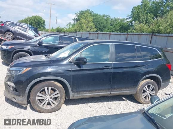 ✅ 2017 Honda Pilot EX-L • VIN: 5FNYF6H50HB083964 • Lot: 42658688. Listed on IAAI with 128,689 mi. Free auction sales archive from the USA and detailed vehicle history report at DreamBid. Image 15.