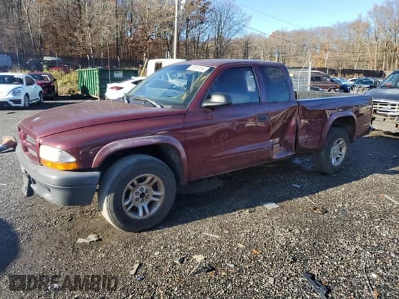 ✅ 2003 Dodge Dakota • VIN: 1D7HL12X43S207435 • Лот: 80863154. Размещён на Copart с пробегом 157 376 миль миль. Получите бесплатный доступ к архиву аукционных продаж из США и посмотрите подробный отчёт об истории автомобиля на DreamBid. Изображение 1.