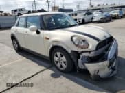 ✅ 2015 MINI Hardtop 4 Door • VIN: WMWXS5C53FT829954 • Lot: 84423345. Listed on Copart with 78,429 mi. Free auction sales archive from the USA and detailed vehicle history report at DreamBid. Image 4.