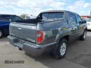 ✅ 2013 Honda Ridgeline RTS • VIN: 5FPYK1F4XDB016430 • Lot: 41711524. Listed on IAAI with 132,185 mi. Free auction sales archive from the USA and detailed vehicle history report at DreamBid. Image 4.