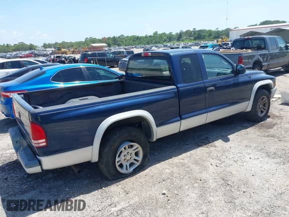 2003 Dodge Dakota SLT with VIN 1D7HL42N83S256346, listed as a IAAI auction lot 42454110 with 75,961 mi miles and . Bid and sale history available at DreamBid. Image 4.