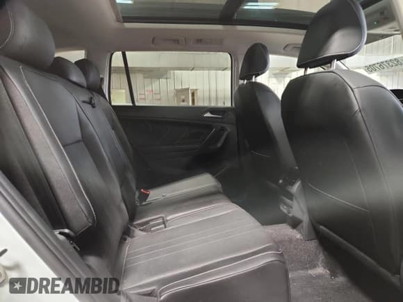 ✅ 2023 Volkswagen Tiguan SE • VIN: 3VVMB7AXXPM068802 • Lot: 82376705. Listed on Copart with 33,596 mi. Free auction sales archive from the USA and detailed vehicle history report at DreamBid. Image 11.