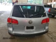 ✅ 2005 Volkswagen Touareg • VIN: WVGBG77L25D014636 • Lot: 66394565. Wystawiony na Copart z przebiegiem 190 838 mil. Bezpłatny archiwum sprzedaży aukcyjnych z USA i szczegółowy raport historii pojazdu na DreamBid. Zdjęcie 6.