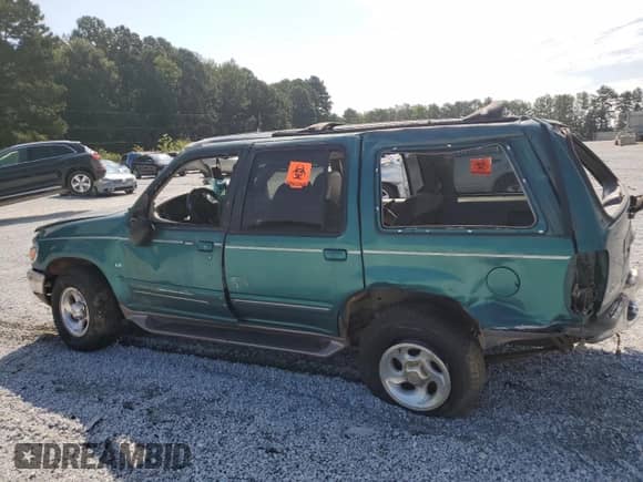 1998 Ford Explorer XLT z VIN 1FMZU32P8WZA15594, wystawiony jako Copart lot #69445705 z przebiegiem Nie podano mil oraz Szkoda całkowita • Salvage title. Historia ofert i sprzedaży dostępna na DreamBid. Obrazek 2.