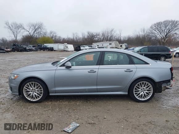 ✅ 2016 Audi A6 Premium Plus • VIN: WAUGFAFC7GN056094 • Лот: 43650125. Опубликован ранее на IAAI с пробегом 125 093 миль. Бесплатный доступ к архиву аукционных продаж из США и подробный отчёт об истории автомобиля на DreamBid. Изображение 14.