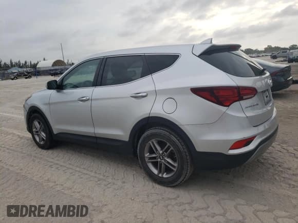 ✅ 2017 Hyundai Santa Fe 2.4L • VIN: 5XYZT3LB5HG437527 • Лот: 51944894. Опубликован ранее на Copart с пробегом 111 221 миль. Бесплатный доступ к архиву аукционных продаж из США и подробный отчёт об истории автомобиля на DreamBid. Изображение 2.