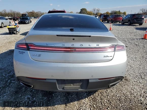 ✅ 2015 Lincoln MKZ • VIN: 3LN6L2G90FR621180 • Лот: 90700375. Опубликован ранее на Copart с пробегом 129 124 миль. Бесплатный доступ к архиву аукционных продаж из США и подробный отчёт об истории автомобиля на DreamBid. Изображение 6.