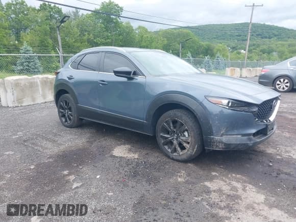 ✅ 2022 Mazda CX-30 S Carbon Edition • VIN: 3MVDMBCL8NM430370 • Lot: 42340348. Listed on IAAI with 79,513 mi. Free auction sales archive from the USA and detailed vehicle history report at DreamBid. Image 1.