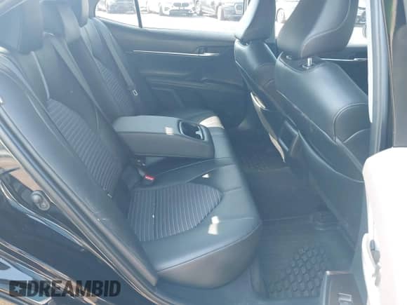 2023 Toyota Camry SE with VIN 4T1G11BKXPU097643, listed as a IAAI auction lot 42833306 with 23,580 mi miles and . Bid and sale history available at DreamBid. Image 8.