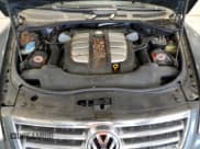 ✅ 2006 Volkswagen Touareg • VIN: WVGPT77LX6D056538 • Lot: 51330225. Listed on Copart with 183,060 mi. Free auction sales archive from the USA and detailed vehicle history report at DreamBid. Image 12.