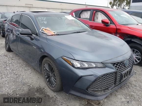 ✅ 2021 Toyota Avalon Hybrid XSE • VIN: 4T1EA1AB2MU001301 • Lot: 41870872. Wystawiony na IAAI z przebiegiem 49 962 mil. Bezpłatny archiwum sprzedaży aukcyjnych z USA i szczegółowy raport historii pojazdu na DreamBid. Zdjęcie 1.