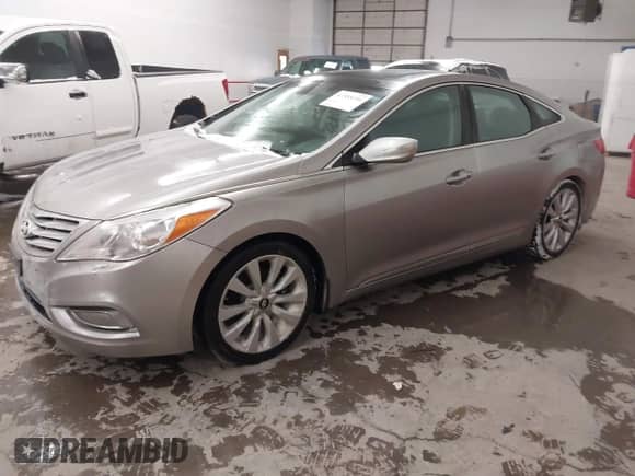 2013 Hyundai Azera с VIN KMHFH4JG2DA225778, выставлен на аукционе IAAI как лот 41558254 с пробегом 158 888 миль миль и . История ставок и продаж доступна на DreamBid. Изображение 2.
