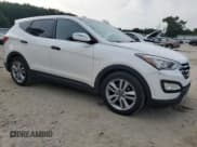 ✅ 2013 Hyundai Santa Fe Sport • VIN: 5XYZW3LA6DG009927 • Lot: 82086585. Listed on Copart with 109,101 mi. Free auction sales archive from the USA and detailed vehicle history report at DreamBid. Image 4.