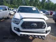 ✅ 2018 Toyota Tacoma SR5 • VIN: 3TMDZ5BN0JM041160 • Лот: 42571752. Опубликован ранее на IAAI с пробегом 106 989 миль. Бесплатный доступ к архиву аукционных продаж из США и подробный отчёт об истории автомобиля на DreamBid. Изображение 12.