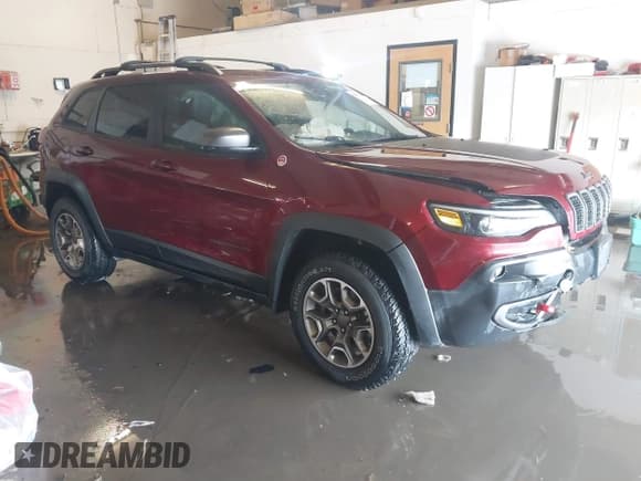 ✅ 2021 Jeep Cherokee Trailhawk • VIN: 1C4PJMBX4MD206997 • Lot: 41565140. Listed on IAAI with Not provided. Free auction sales archive from the USA and detailed vehicle history report at DreamBid. Image 1.
