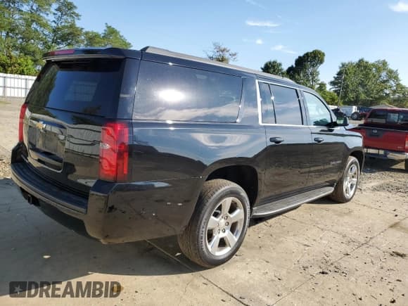 ✅ 2020 Chevrolet Suburban LS • VIN: 1GNSKGKC1LR279629 • Lot: 80777405. Listed on Copart with 95,401 mi. Free auction sales archive from the USA and detailed vehicle history report at DreamBid. Image 3.