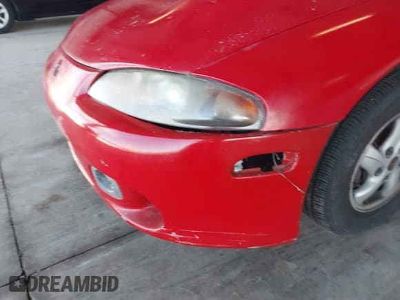 ✅ 1999 Mitsubishi Eclipse RS • VIN: 4A3AK34Y5XE085606 • Lot: 41583304. Wystawiony na IAAI z przebiegiem 277 195 mil. Bezpłatny archiwum sprzedaży aukcyjnych z USA i szczegółowy raport historii pojazdu na DreamBid. Zdjęcie 6.