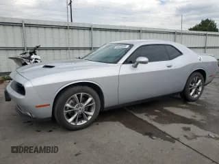 ✅ 2021 Dodge Challenger SXT • VIN: 2C3CDZGG3MH560982 • Lot: 65565605. Wystawiony na Copart z przebiegiem 70 876 mil. Bezpłatny archiwum sprzedaży aukcyjnych z USA i szczegółowy raport historii pojazdu na DreamBid. Zdjęcie 1.