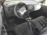 2001 Dodge Dakota Sport z VIN 1B7GG26N81S262671, wystawiony jako Copart lot #71080995 z przebiegiem 145 480 mil mil oraz Szkoda całkowita • Salvage title. Historia ofert i sprzedaży dostępna na DreamBid. Obrazek 8.