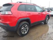 ✅ 2019 Jeep Cherokee Trailhawk • VIN: 1C4PJMBX4KD121168 • Lot: 41680398. Listed on IAAI with 128,931 mi. Free auction sales archive from the USA and detailed vehicle history report at DreamBid. Image 4.