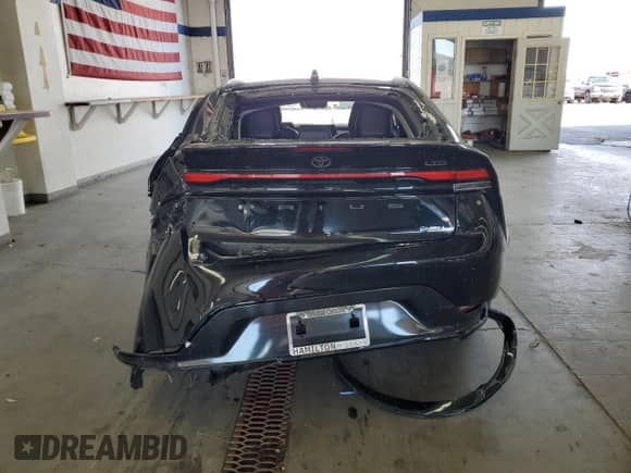 2023 Toyota Prius LE with VIN JTDADABU0P3003018, listed as a Copart auction lot 69386605 with Not provided miles and Salvage title. Bid and sale history available at DreamBid. Image 6.