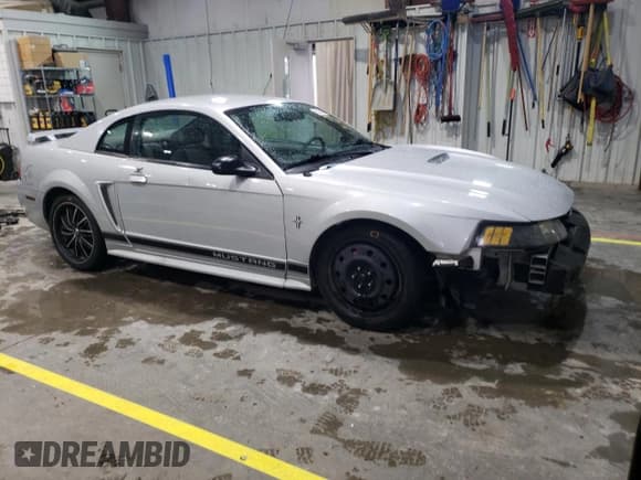 ✅ 2002 Ford Mustang Standard • VIN: 1FAFP40432F106903 • Lot: 55350025. Listed on Copart with 253,395 mi. Free auction sales archive from the USA and detailed vehicle history report at DreamBid. Image 4.