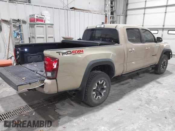 ✅ 2018 Toyota Tacoma SR5 • VIN: 3TMDZ5BN1JM046979 • Lot: 41827502. Listed on IAAI with 59,043 mi. Free auction sales archive from the USA and detailed vehicle history report at DreamBid. Image 4.