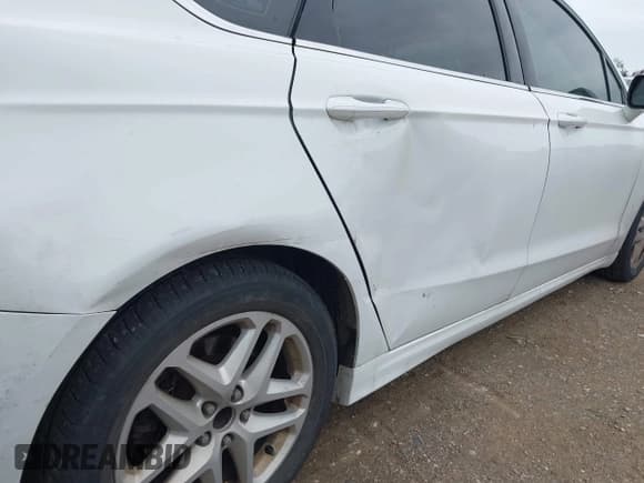 ✅ 2016 Ford Fusion SE • VIN: 3FA6P0H77GR140327 • Lot: 42319297. Listed on IAAI with 221,392 mi. Free auction sales archive from the USA and detailed vehicle history report at DreamBid. Image 18.