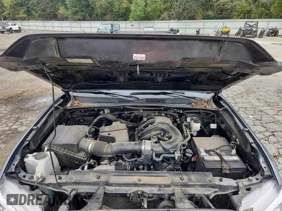 ✅ 2023 Toyota Tacoma SR5 • VIN: 3TMAZ5CN4PM200627 • Лот: 90209385. Опубликован ранее на Copart с пробегом 61 460 миль. Бесплатный доступ к архиву аукционных продаж из США и подробный отчёт об истории автомобиля на DreamBid. Изображение 11.