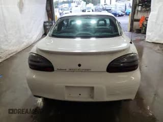 ✅ 1999 Pontiac Grand Prix GT • VIN: 1G2WP12K2XF200884 • Лот: 73360574. Опубликован ранее на Copart с пробегом 105 461 миль. Бесплатный доступ к архиву аукционных продаж из США и подробный отчёт об истории автомобиля на DreamBid. Изображение 6.