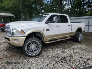 ✅ 2014 Ram 2500 Longhorn • VIN: 3C6UR5GLXEG280024 • Lot: 61231805. Listed on Copart with 225,366 mi. Free auction sales archive from the USA and detailed vehicle history report at DreamBid. Image 1.